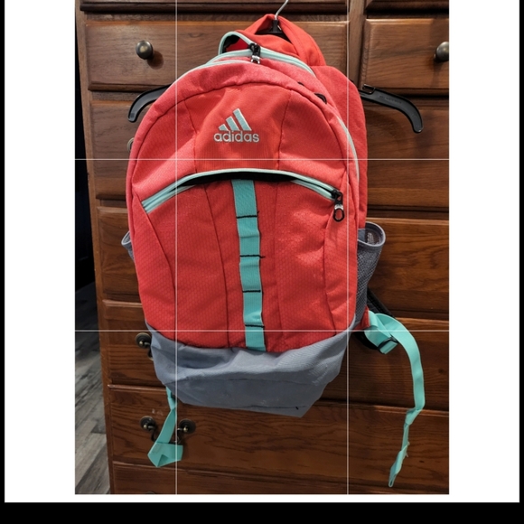 Adidas Tangerine backpack, LIKE NEW, 3 zip large pockets. 2 side holders,
